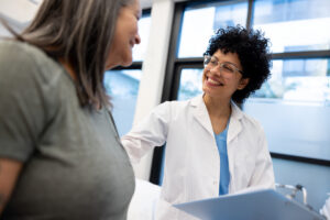Healthcare provider discussing personalized recovery care options with a patient after a car accident.